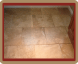 This Travertine Floor was beautiful but the grout was soiled because of improper cleaning product.